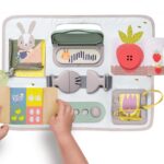 Activitity Buckle Board Urban Garden Taf Toys