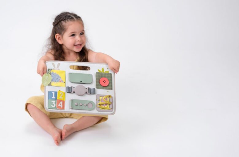 Activitity Buckle Board Urban Garden Taf Toys