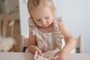 Babyspeeltje Flower Soft Lilac Press Toy Mushie