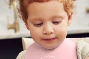Slabbetje Pastelroze Babybjorn